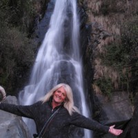 Martha Halda, taking in a Himalayan waterfall